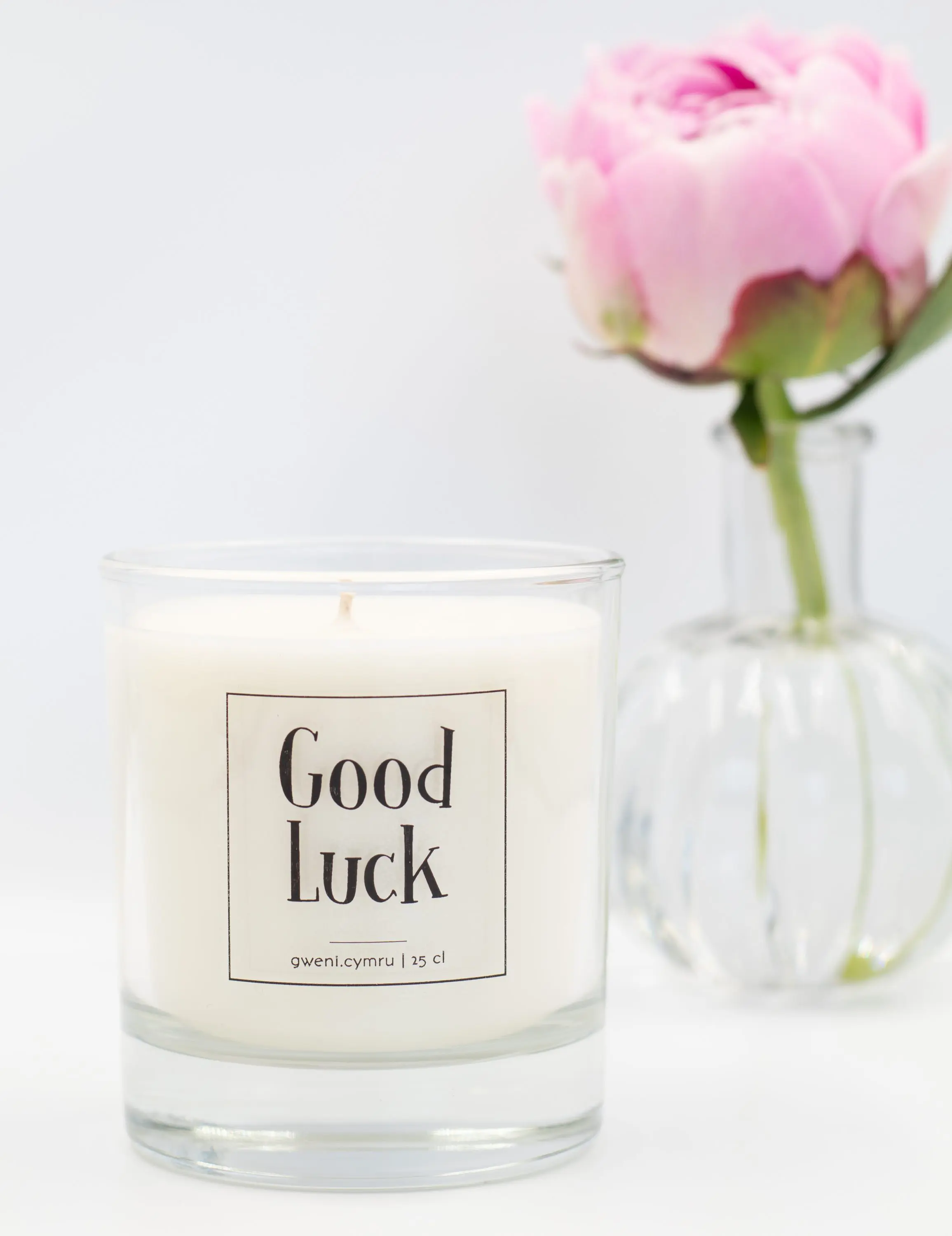 An image of the soy candle with 'Good Luck' label